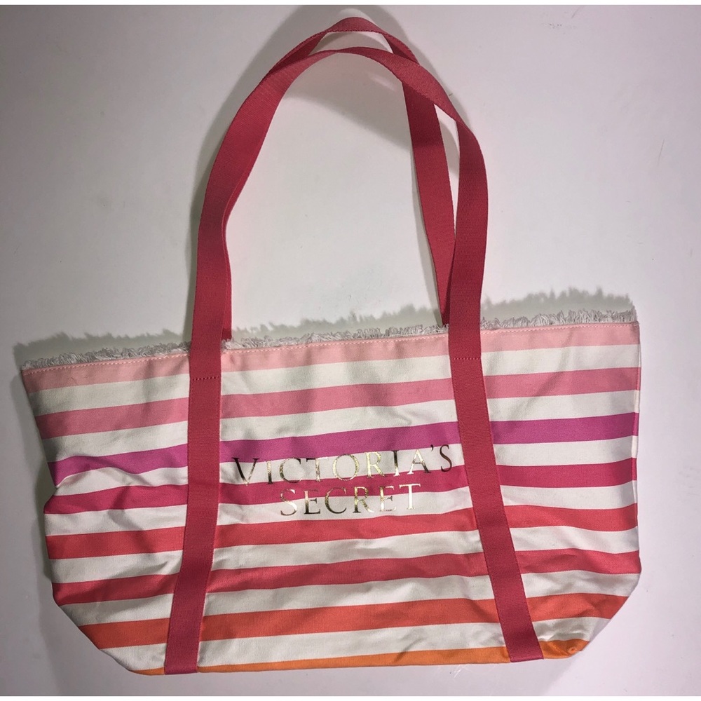 Victoria’s Secret tote bag.